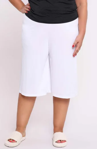 Pusiau slystančios baltos spalvos Mewa kelnės